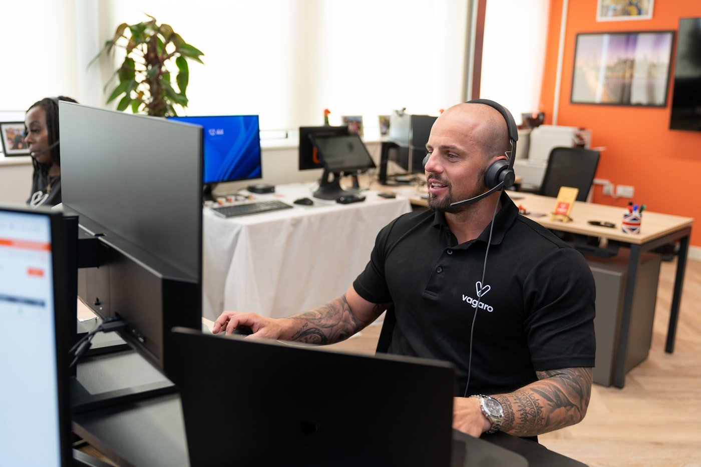 Professional call center agent conducting a high-intent live transfer to a licensed insurance agent